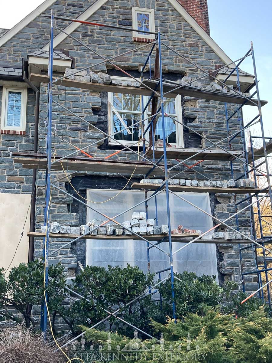 After we carefully removed the stone around each opening of this Gladwyne, PA home, one window at a time was skillfully removed, to address any repairs needed and properly flash. 