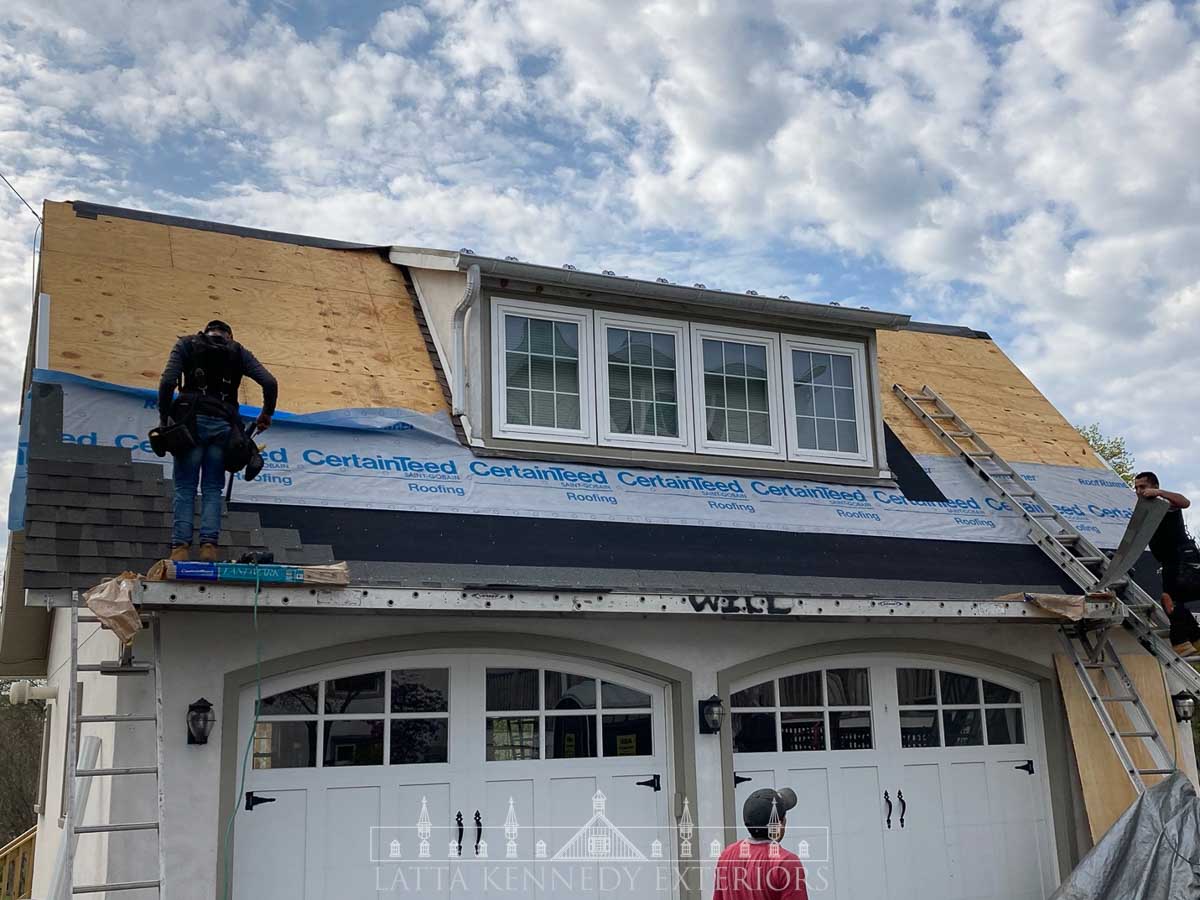 Underlayment laid and CertainTeed Landmark shingles started.