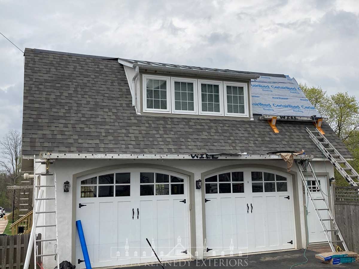 Almost completed. Malvern, PA new garage roof installed. The end result was a new roof that looks great!