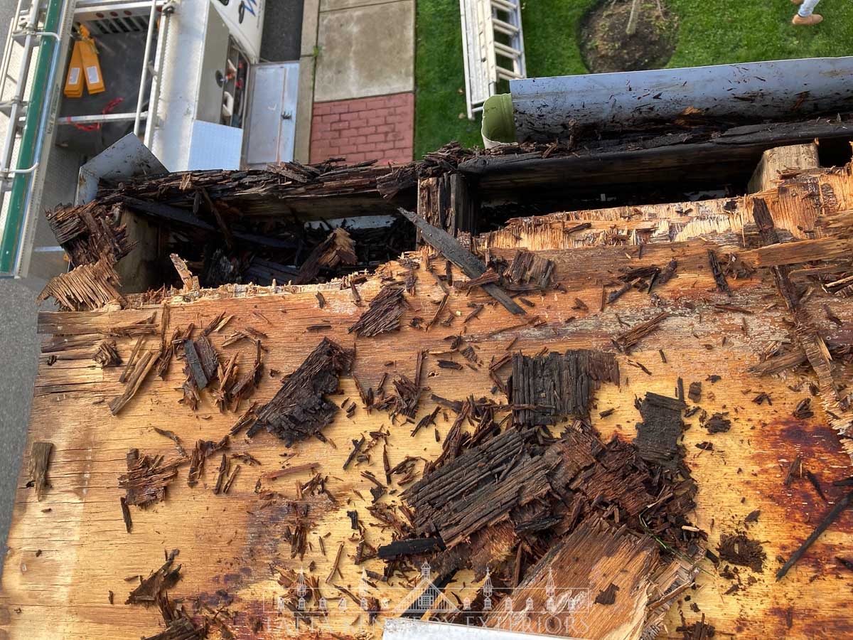 Rotten sheathing, fascia, and rafter tails were discovered.