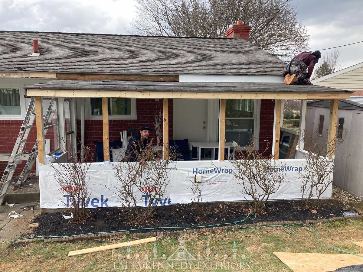 Preparing for new window installation at sunroom. Tyvek house wrap installed, as well as custom aluminum sill pans for each opening.