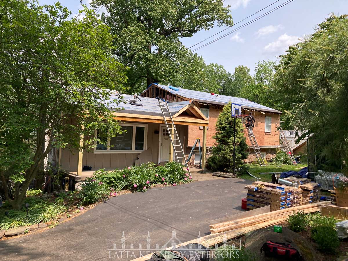 The entire main house is watertight, and the existing siding is carefully removed. Celotex insulation board was removed and replaced with ½" Sheathing. Existing, unused main chimney has been carefully demolished and replaced with new ½" Sheathing. 